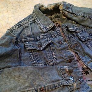 Distressed denim jacket